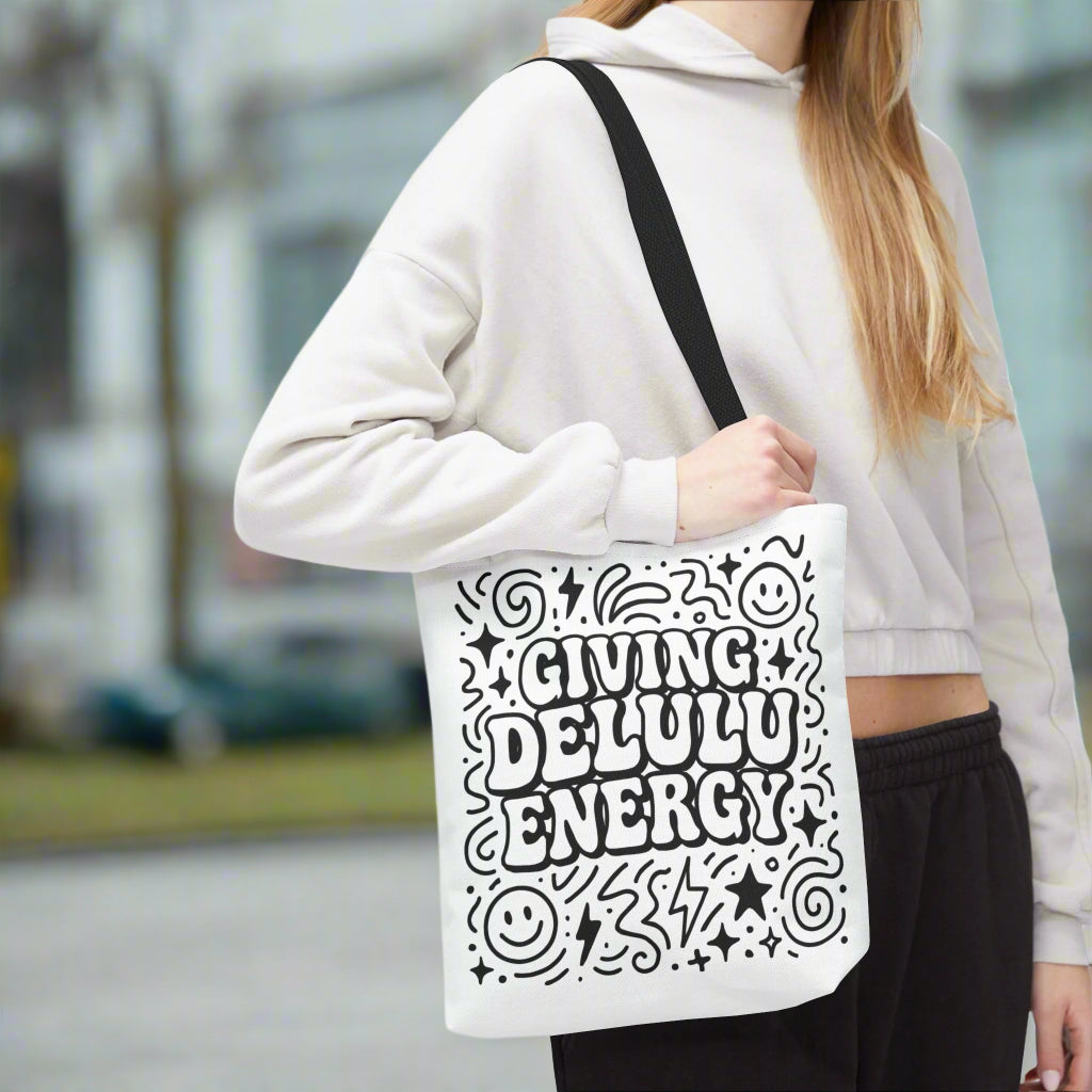 giving delulu energy text on tote bag