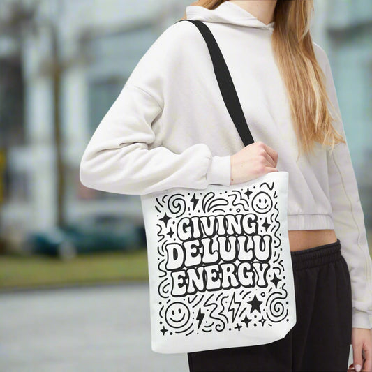 giving delulu energy text on tote bag